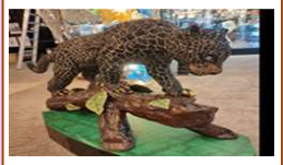 A large leopard inlaid with Chatons on a golden branch