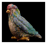 A small bird inlaid with colored chatons 8/6/12
